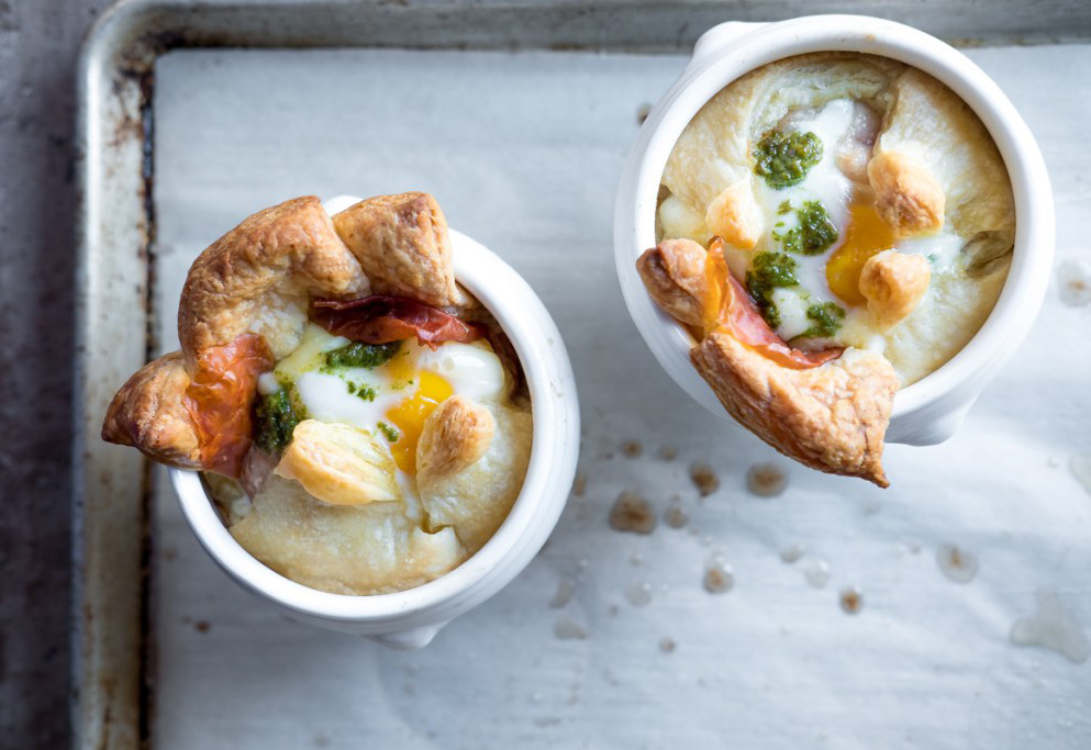 Baked Eggs with Puff Pastry, Brie, Prosciutto and Pesto