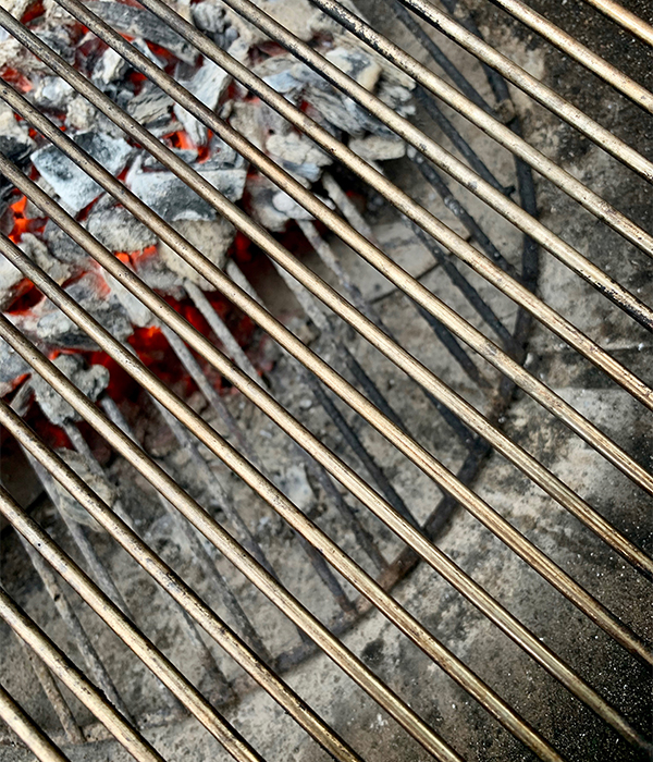 Charcoal grill after being cleaned in preparation for summer