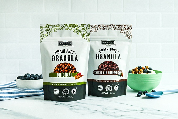 One great breakfast item for your back-to-school grocery list: 2 bags of Witzi's Grain Free Granola on a white countertop
