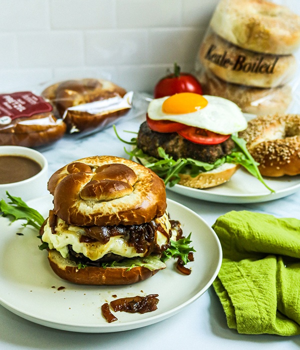 Elevated Cheeseburger and Breakfast-for-dinner Burger on plates