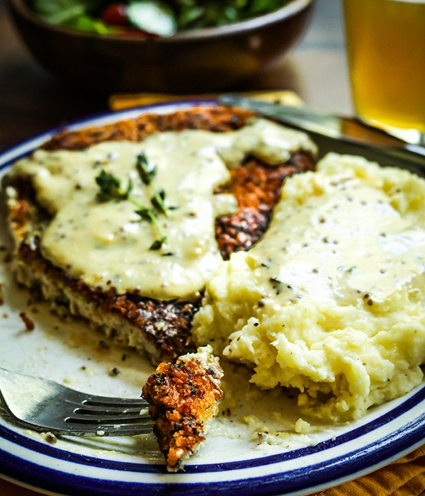 Pork Schnitzel on a plate with mashed potatoes