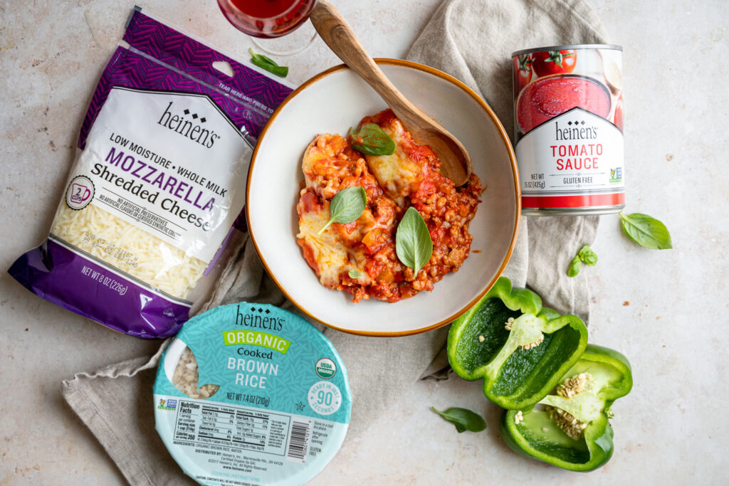 A pasta dish made with Heinen's brand label ingredients including mozzarella cheese, tomato sauce, and cooked brown rice.