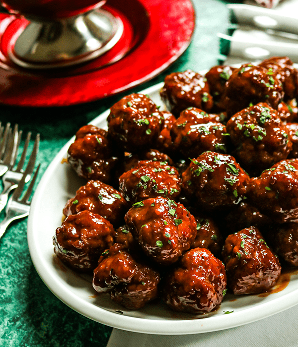 A Close Up Image of a Plate of Grape Jelly Meatballs