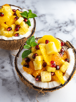 Lucky Fruit Salad in a Coconut Bowl