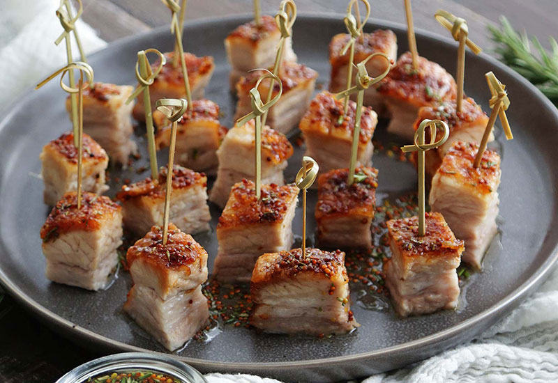 Confit pork belly with cannellini beans & rosemary recipe